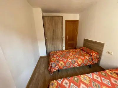 Cama o camas de una habitación en Duplex tres habitaciones Pirineo