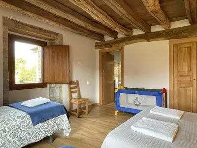 Cama o camas de una habitación en Palacio de Aralar Grande Familias
