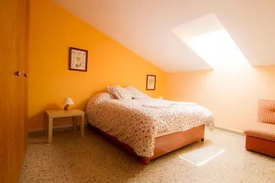 Cama o camas de una habitación en Casa Guaranatura alojamiento y barrancos
