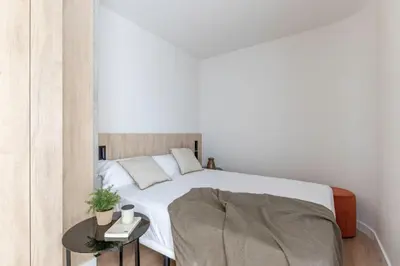 Cama o camas de una habitación en Líbere Pamplona Yamaguchi