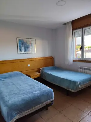 Cama o camas de una habitación en HOSTAL DON JAVIER