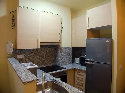 Una cocina o zona de cocina en Grace, apartamento con terraza y vistas