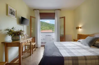 Cama o camas de una habitación en Hotel Lo Foraton