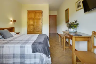 Cama o camas de una habitación en Hotel Lo Foraton