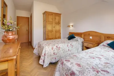 Cama o camas de una habitación en Hotel Lo Foraton
