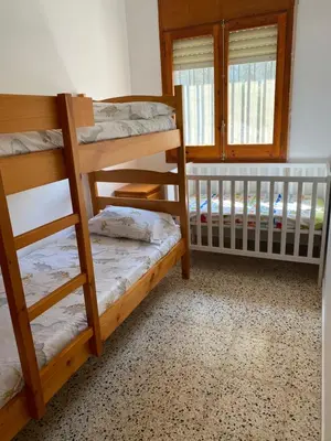 Cama o camas de una habitación en Ca la Sita