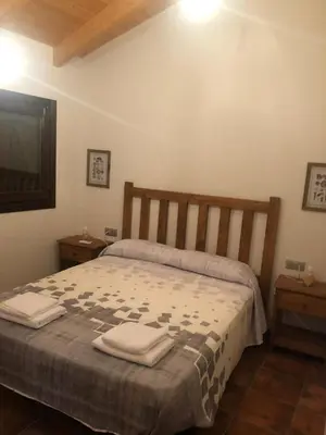 Cama o camas de una habitación en Casa Rural El Corral del Tío Santiago