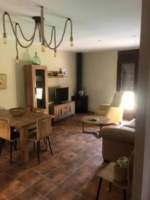 Una televisión o centro de entretenimiento en Casa Rural El Corral del Tío Santiago