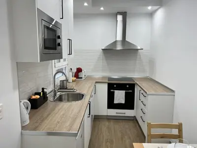 Una cocina o zona de cocina en Apartamenticos Boggiero VI