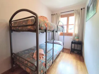 Cama o camas de una habitación en CHECK-IN CASAS Siñoantonio