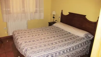 Cama o camas de una habitación en Apartaments la Fabrica