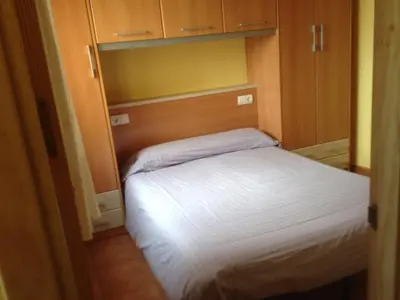 Cama o camas de una habitación en Apartaments la Fabrica