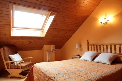 Cama o camas de una habitación en Casa Rural la Comella