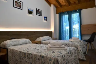 Cama o camas de una habitación en Apartamento El Mirador de la Rua