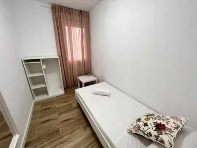 Cama o camas de una habitación en Apartamenticos Libertad I