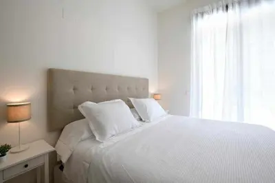 Cama o camas de una habitación en Mike House: Alójate en el corazón de Zaragoza