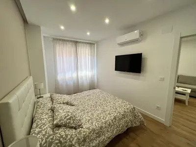 Cama o camas de una habitación en Apartamenticos Boggiero V