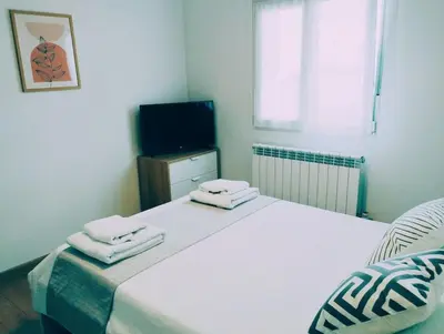 Cama o camas de una habitación en Precioso apartamento en Pamplona junto al centro