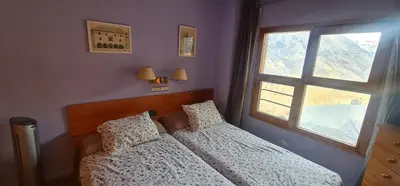 Cama o camas de una habitación en Apartamentos SNÖ Cerler