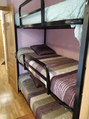 Cama o camas de una habitación en Apartamento en Escarrilla, sallent de gallego