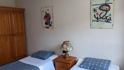 Cama o camas de una habitación en Jarandín 27 - Adosado familiar en Biescas