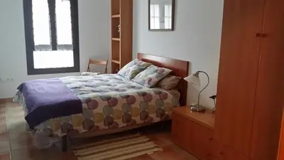 Cama o camas de una habitación en Apartamentos Portal de Ordesa