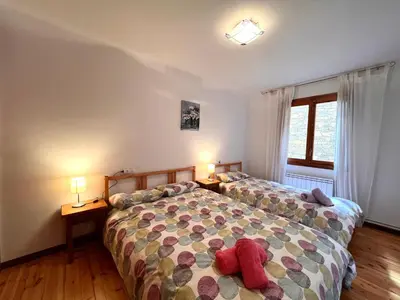 Cama o camas de una habitación en Apartaments Matxicots - L'Amfitriona