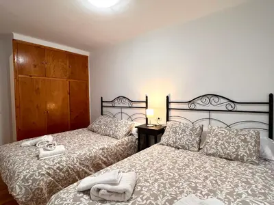 Cama o camas de una habitación en Apartaments Matxicots - L'Amfitriona