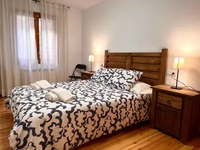 Cama o camas de una habitación en Apartaments Matxicots - L'Amfitriona