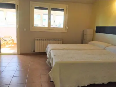 Cama o camas de una habitación en Apartamento EntreRíos