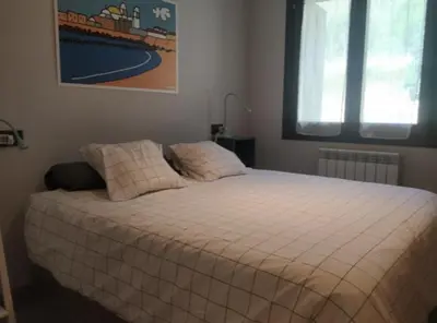 Cama o camas de una habitación en CHECK-IN CASAS La Tuca