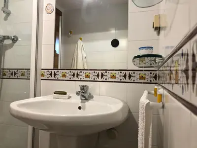 Un baño de Loft acogedor con terraza y parking en el centro