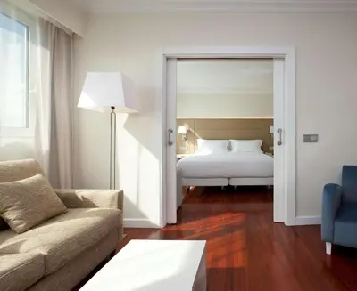 Cama o camas de una habitación en NH Pamplona Iruña Park