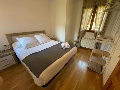 Cama o camas de una habitación en ACOGEDOR PISO EN SORT CON PISCINA