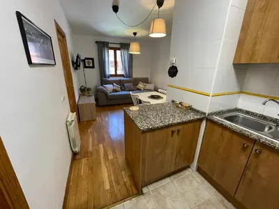 Una cocina o zona de cocina en ACOGEDOR PISO EN SORT CON PISCINA
