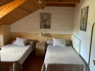 Cama o camas de una habitación en El Cau de Cal Quimet