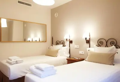Cama o camas de una habitación en Posada de Uncastillo