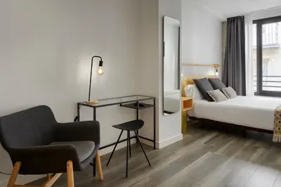 Cama o camas de una habitación en Hostal Arriazu