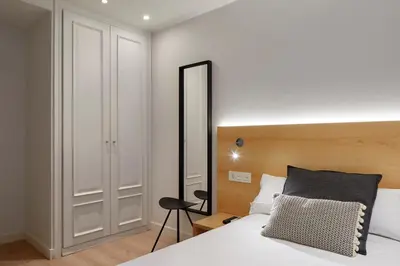 Cama o camas de una habitación en Hostal Arriazu