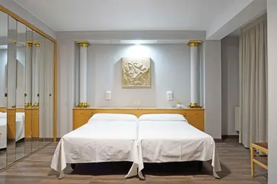 Cama o camas de una habitación en Cesaraugusta