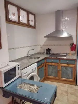 Una cocina o zona de cocina en El Desván del Campanero