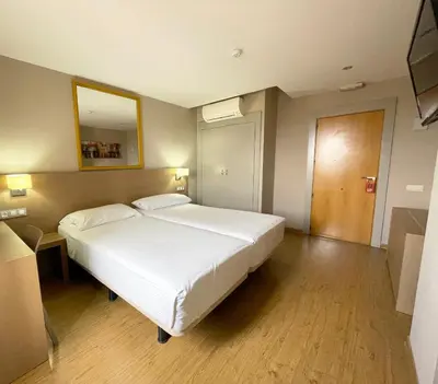 Cama o camas de una habitación en Nuevo Zenit Calahorra