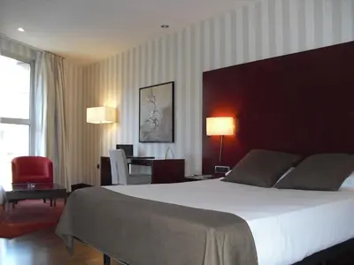 Cama o camas de una habitación en Zenit Lleida