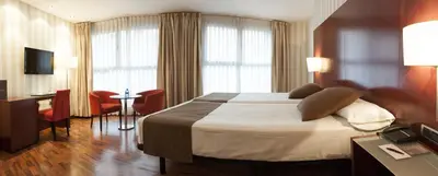 Cama o camas de una habitación en Zenit Lleida