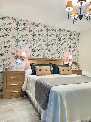 Cama o camas de una habitación en Apartamentos Buganvilla