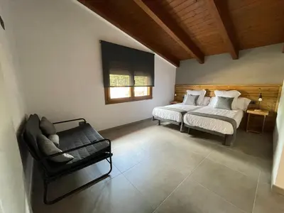 Cama o camas de una habitación en Prades Vila Bella - Casa Molinets i Casa Borrianes
