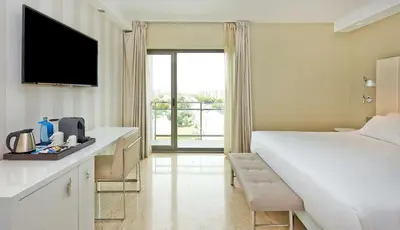 Cama o camas de una habitación en NH Ciudad de Zaragoza