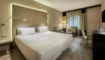 Cama o camas de una habitación en NH Lleida Pirineos