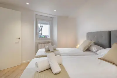 Cama o camas de una habitación en Alojamiento Maite Jaca