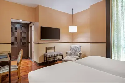 Una televisión o centro de entretenimiento en AC Hotel Ciudad de Tudela by Marriott
